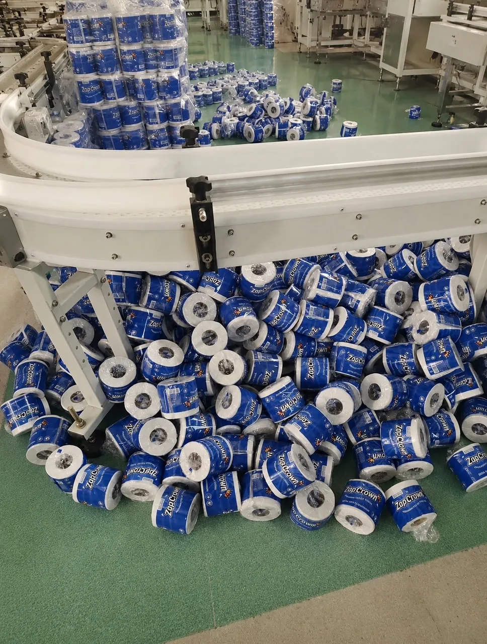 ZapCrown toilet tissue rolls on the production line conveyor