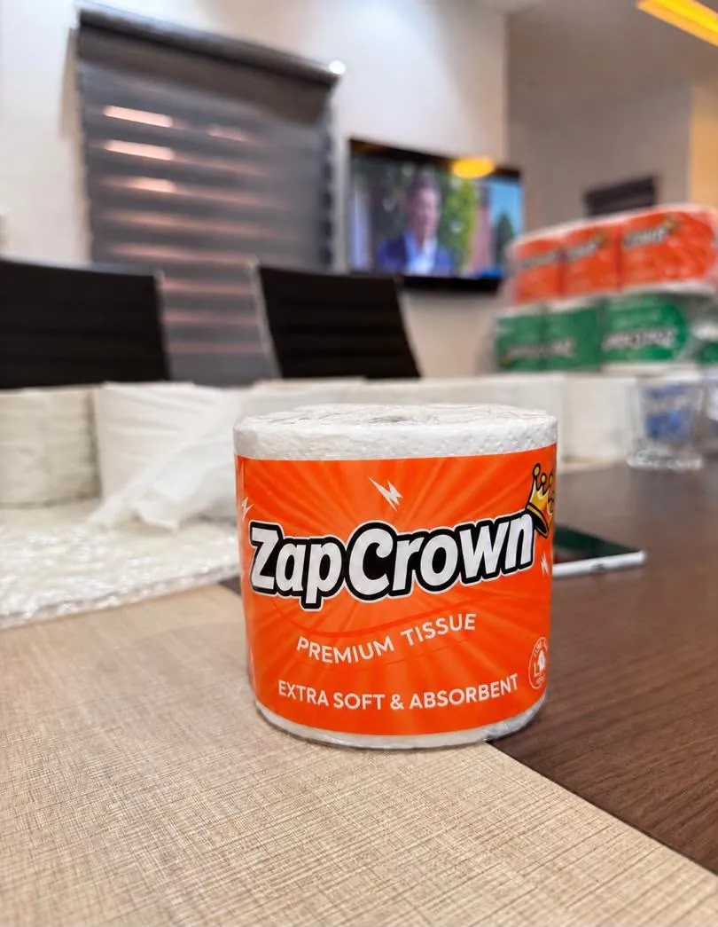 A ZapCrown tissue roll in orange packaging